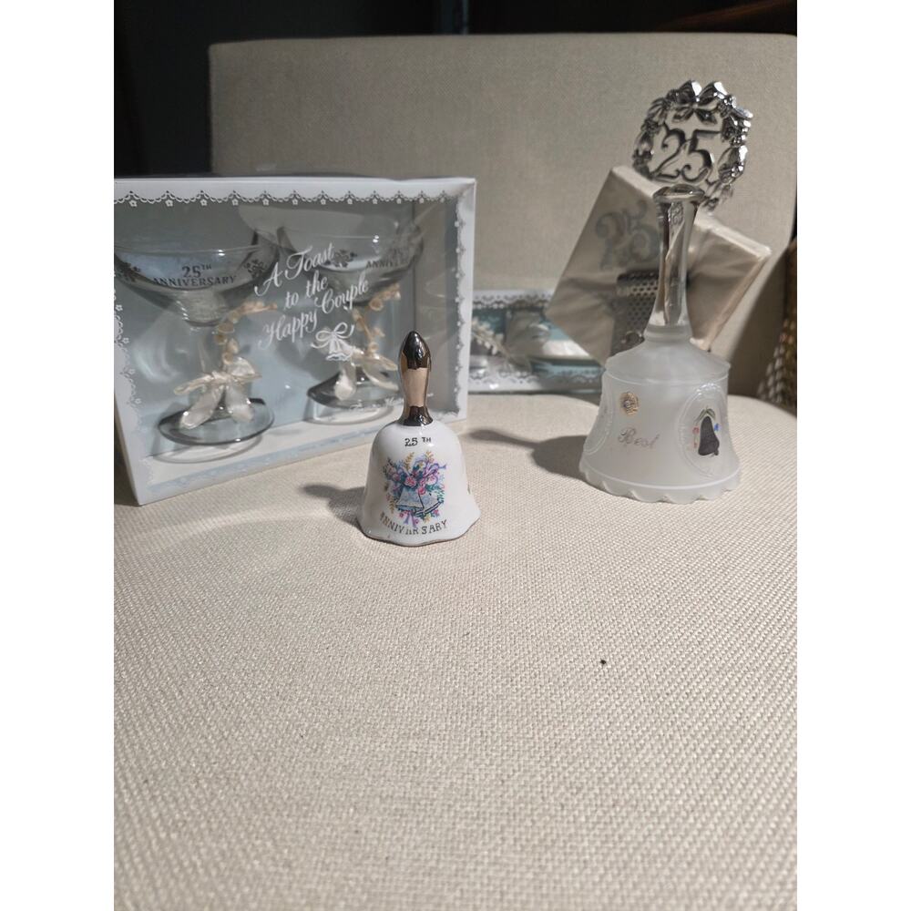 25th Anniversary Party Memorabilia, glasses, bells, knives and Napkin holder.